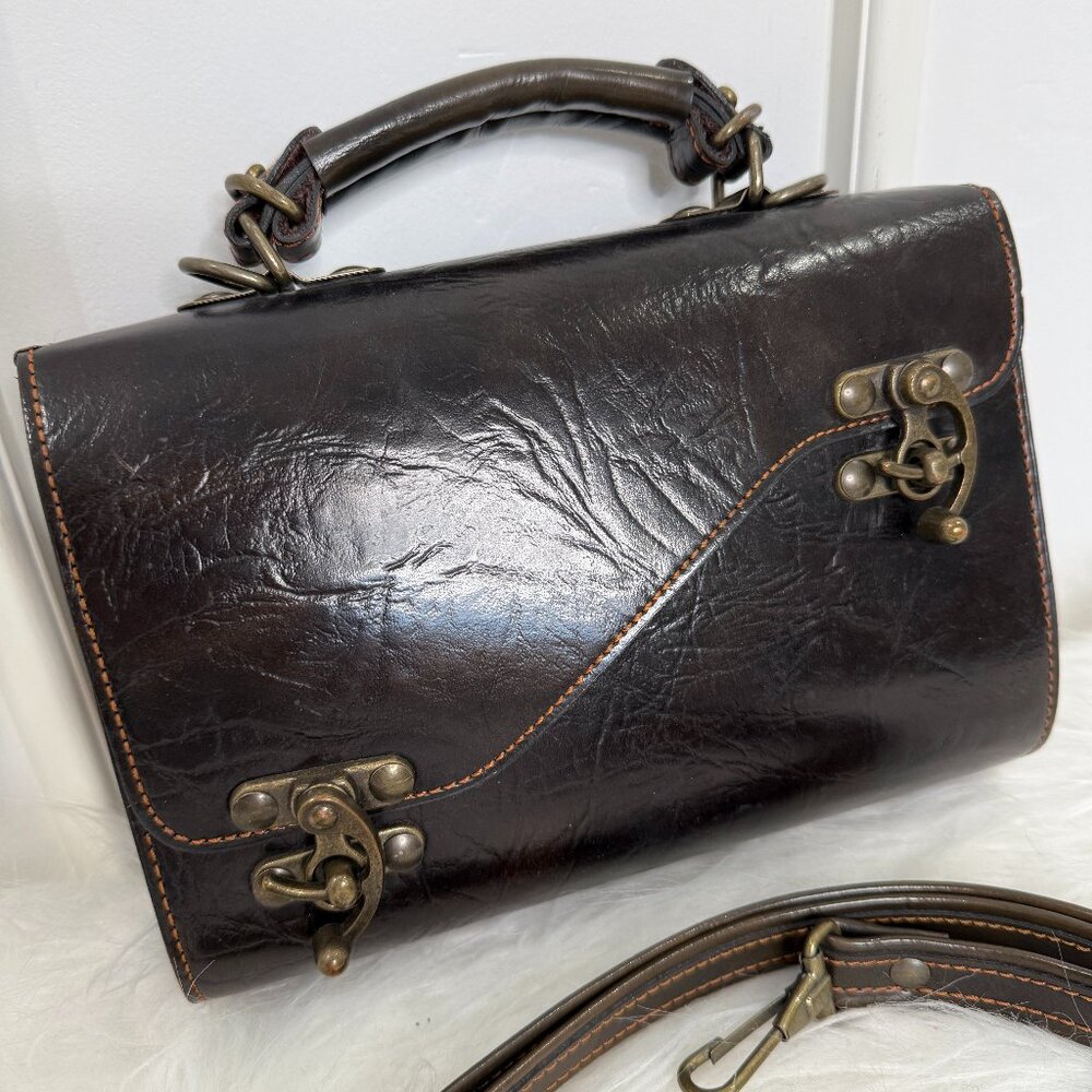 Burgundy leather top handle bag from Paris market